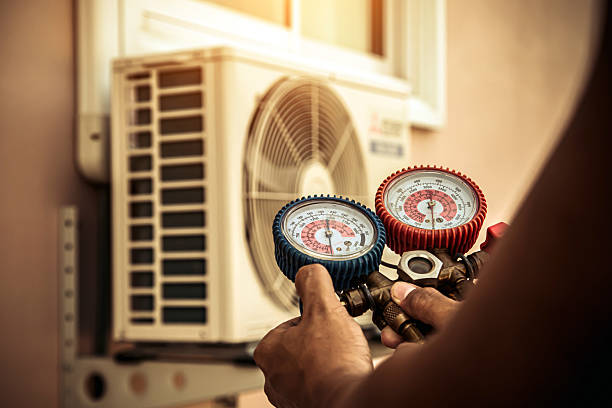 Professional Heat Pump Repair technician working in Livingston, IL